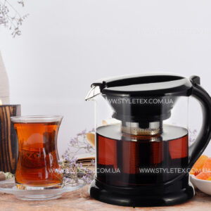 Glass of tea and traditional various baklavas on marble table Чайник заварювальний Kamille KM-0781L