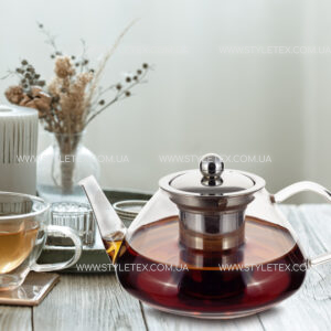 Cozy home composition with a cup of tea, teapot and Scandinavian decor details. Чайник заварювальний Kamille KM-0782S