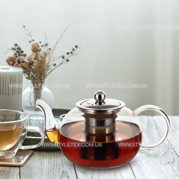 Cozy home composition with a cup of tea, teapot and Scandinavian decor details. Чайник заварювальний Kamille KM-0783S